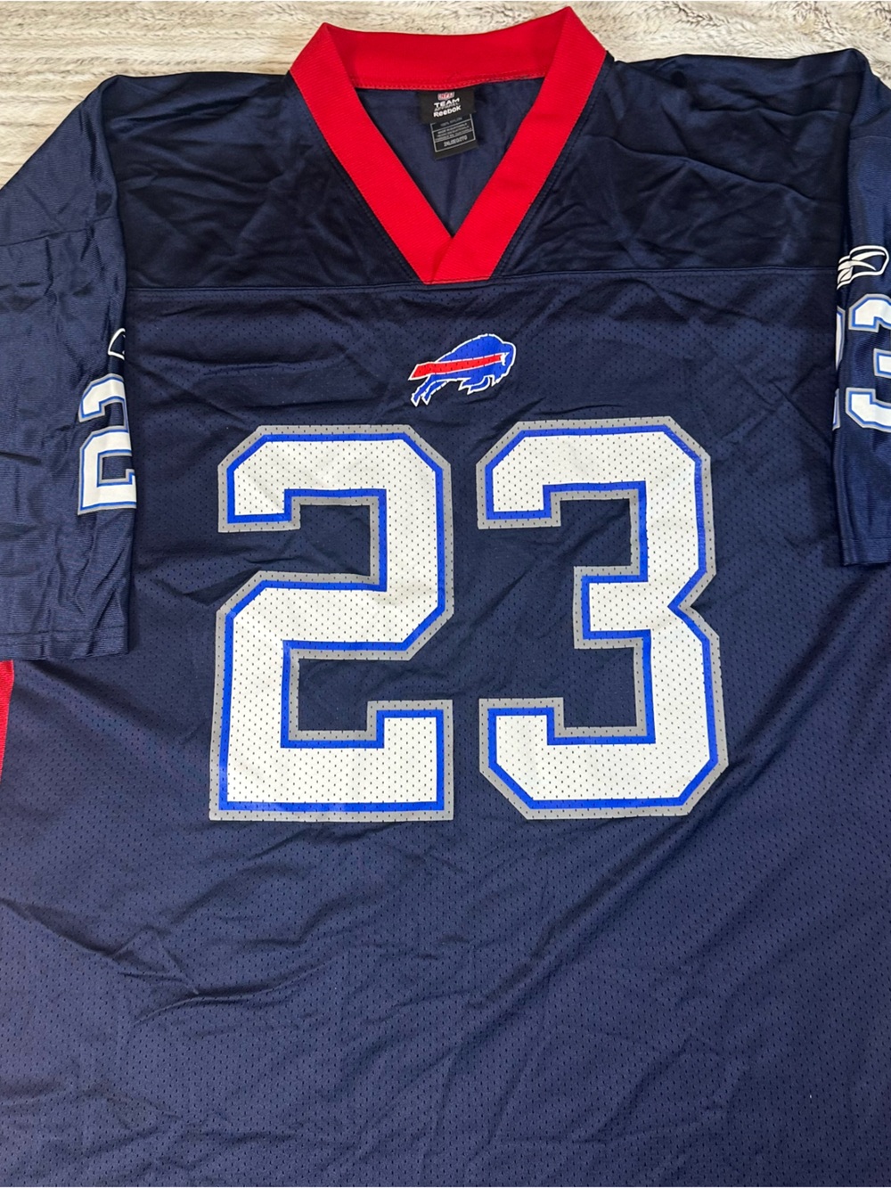 Reebok Navy Blue and Red NFL Football Jersey Tag Detail